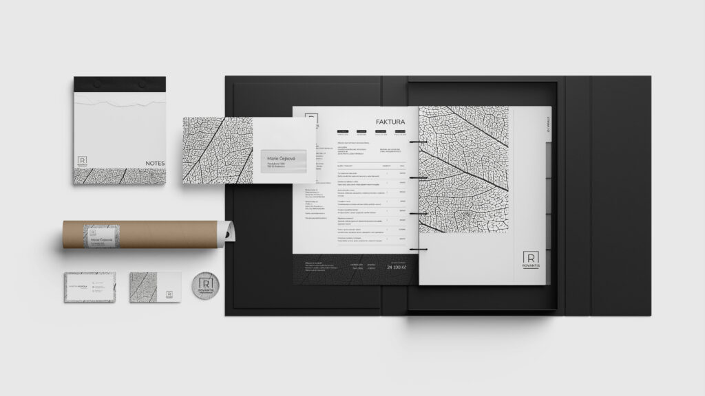 Černobílá firemní identita s vizitkami a brožurou